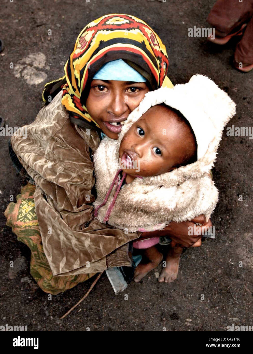 Child begging hi-res stock photography and images - Page 2 - Alamy