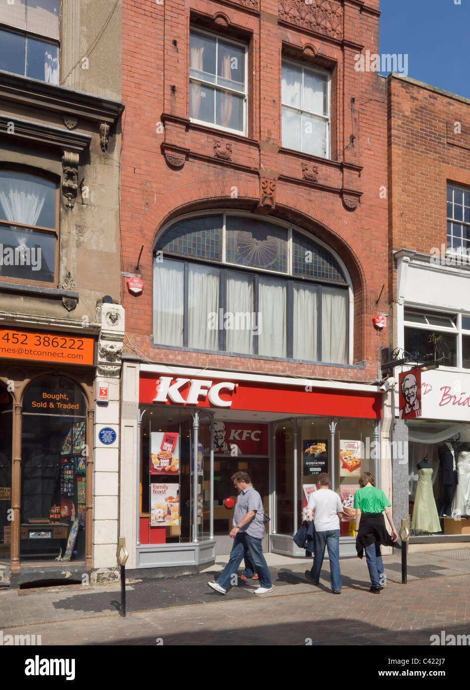 Branch of the KFC fast food chain, formerly Kentucky Fried Chicken, in Westgate Street, Gloucester Stock Photo