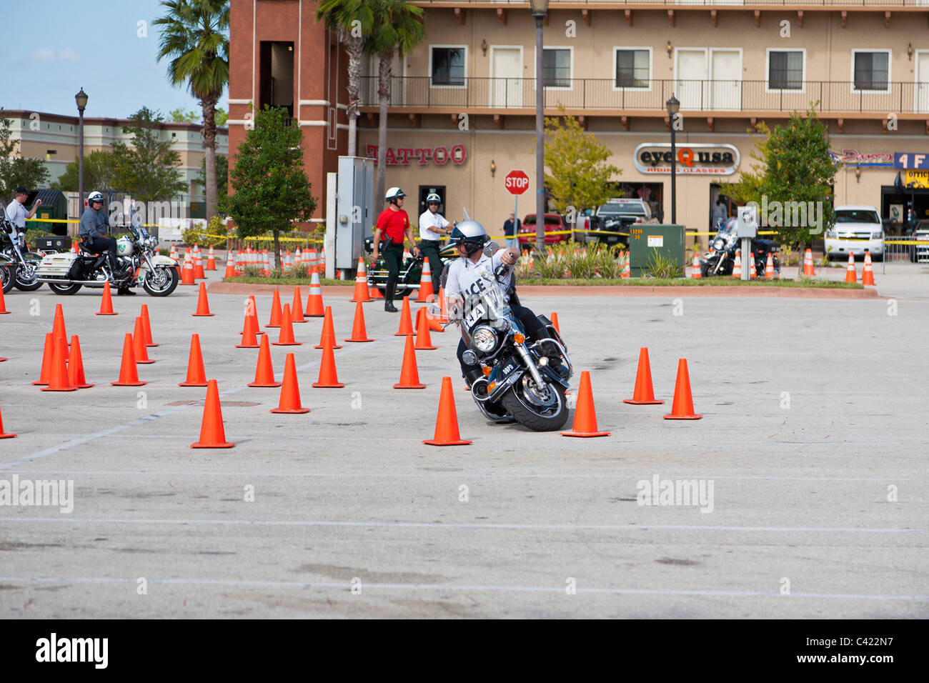 Law enforcement motorcycle teams compete on a cone course at the Bruce