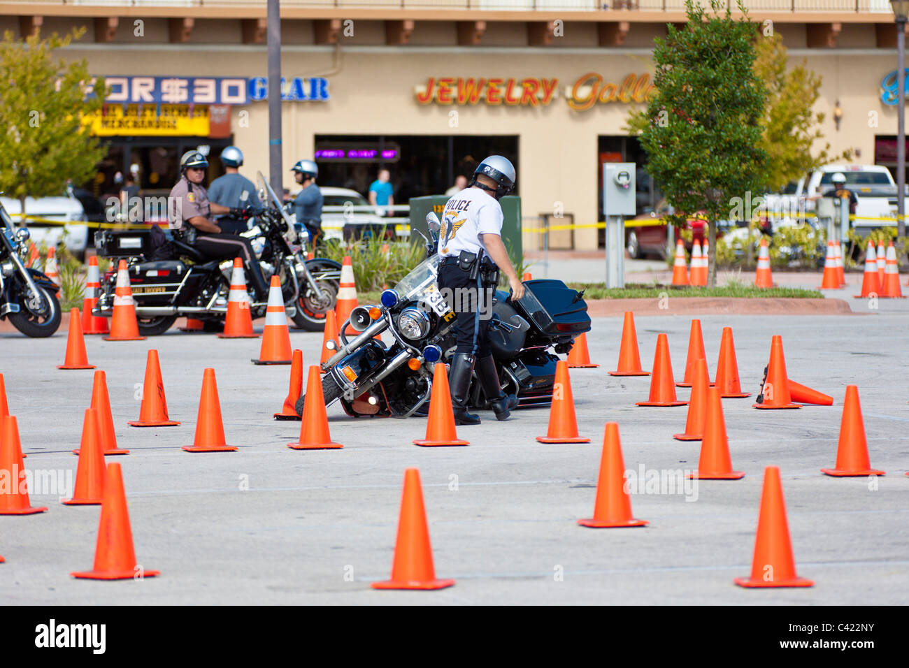 Law enforcement motorcycle teams compete on a cone course at the Bruce