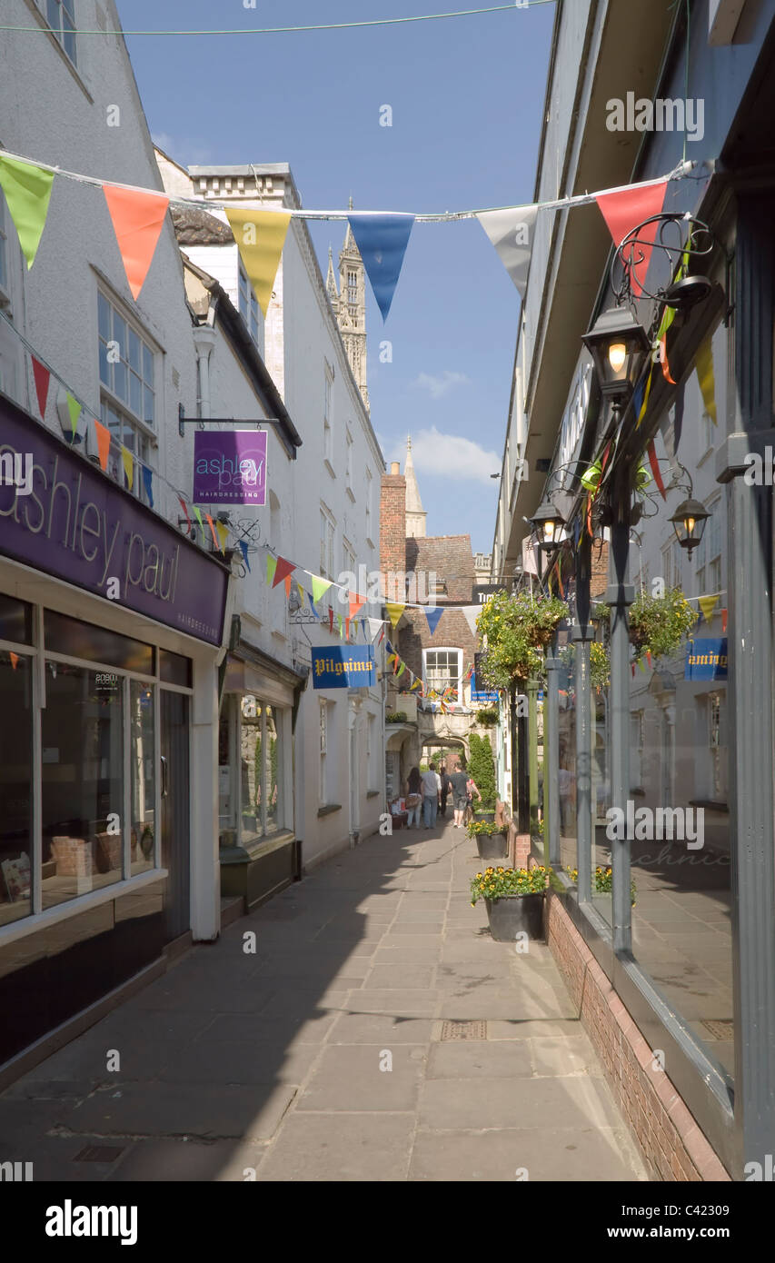 College Court, a narrow lane of shops off Westgate Street, Gloucester. Stock Photo