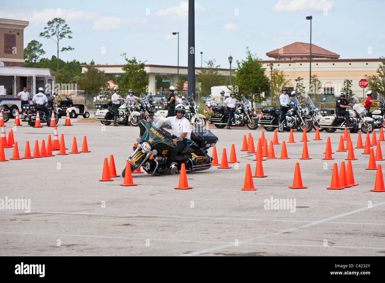 Law enforcement motorcycle teams compete on a cone course at the Bruce