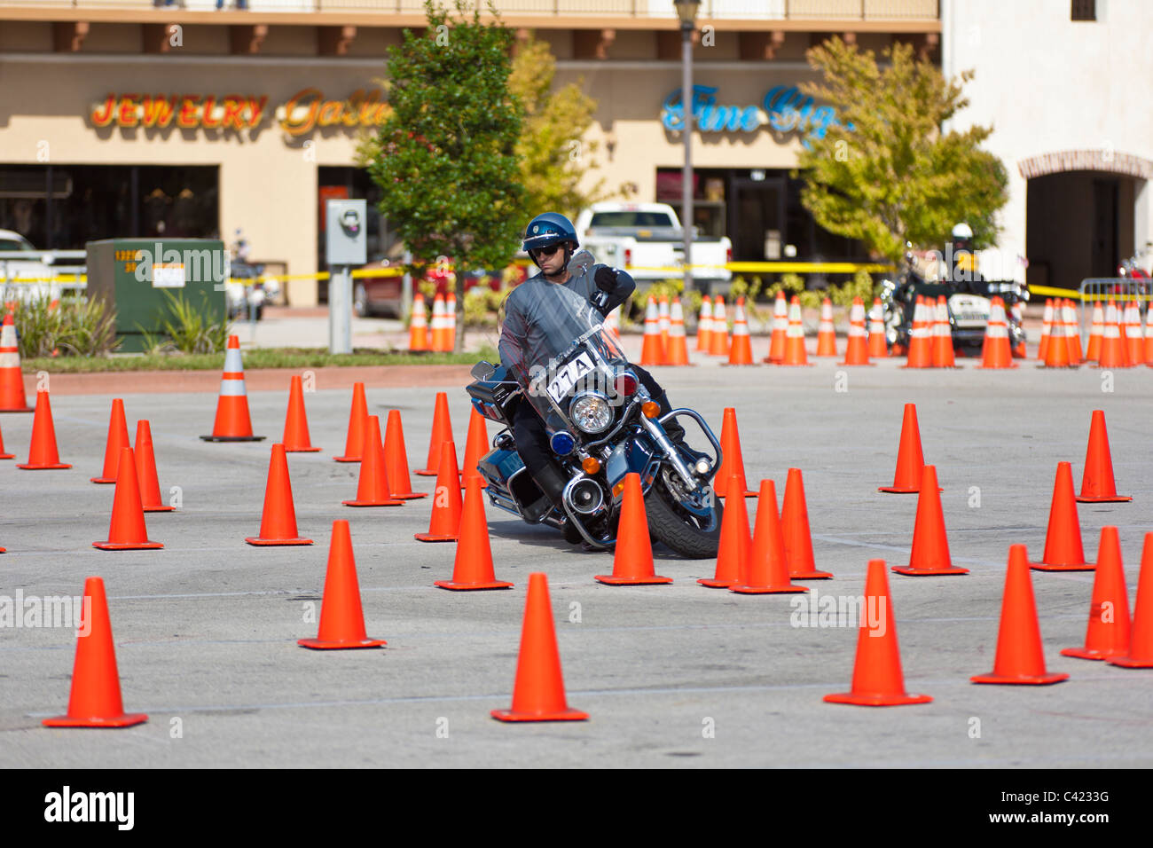 Law enforcement motorcycle teams compete on a cone course at the Bruce