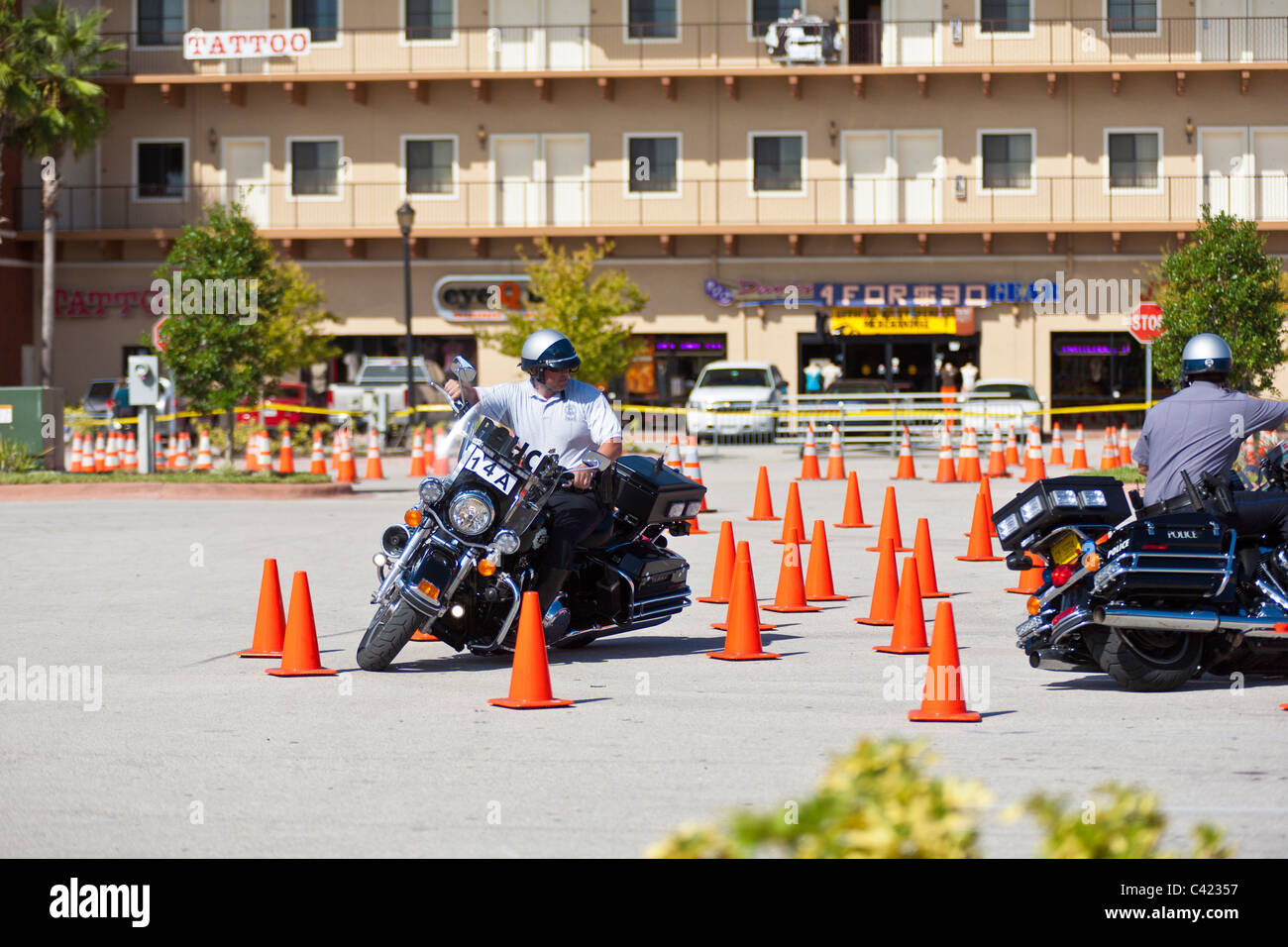 Law enforcement motorcycle teams compete on a cone course at the Bruce