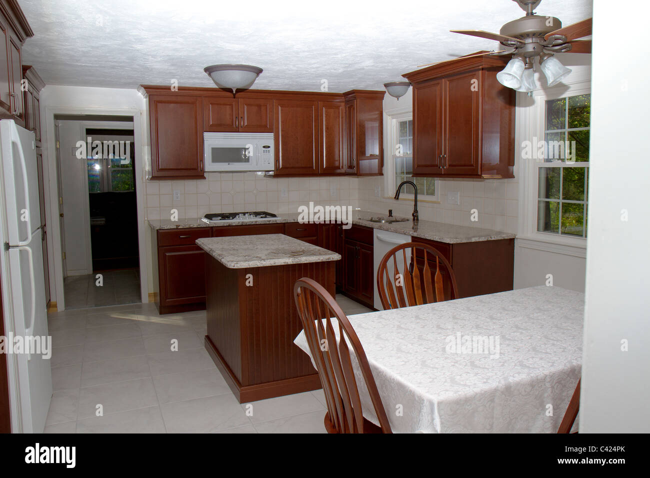 New Cherry Cabinets Granite Counter Tops And Ceramic Tile Floor