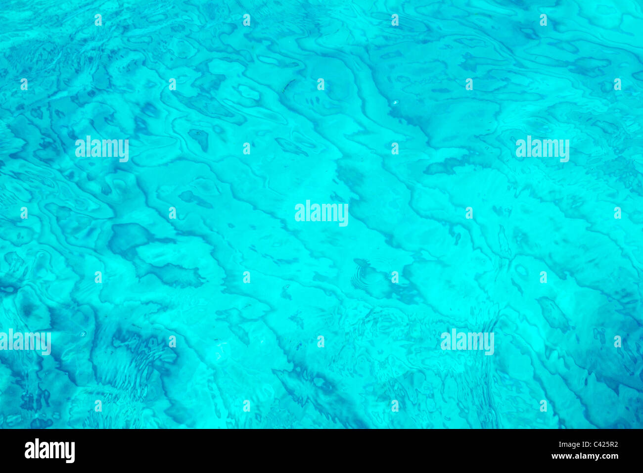 aqua turquoise tropical beach water waves pattern texture Stock Photo