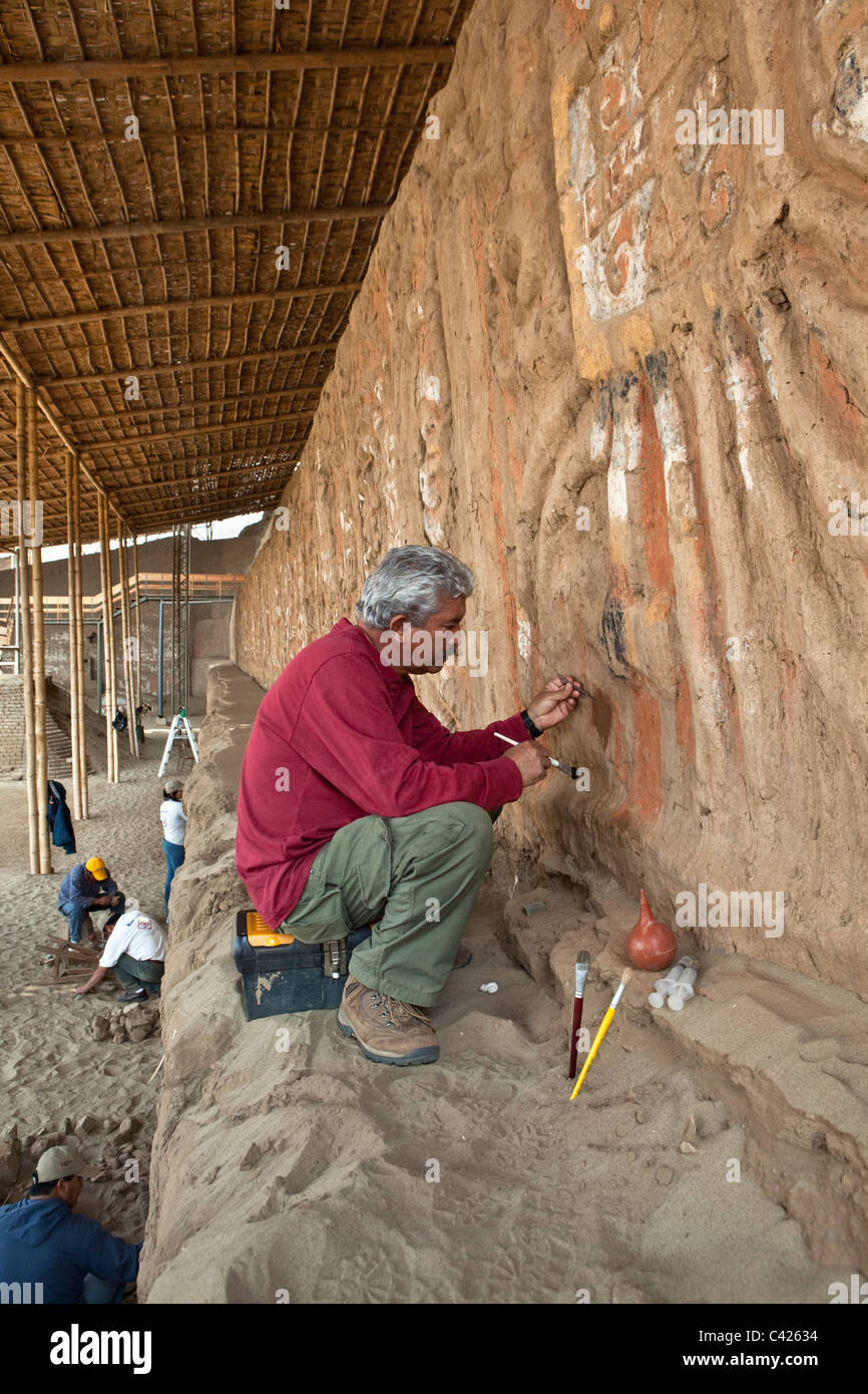 Excavation, conservation and restoration of reliefs and murals. Archaeologist Rafael Gordillo. Stock Photo