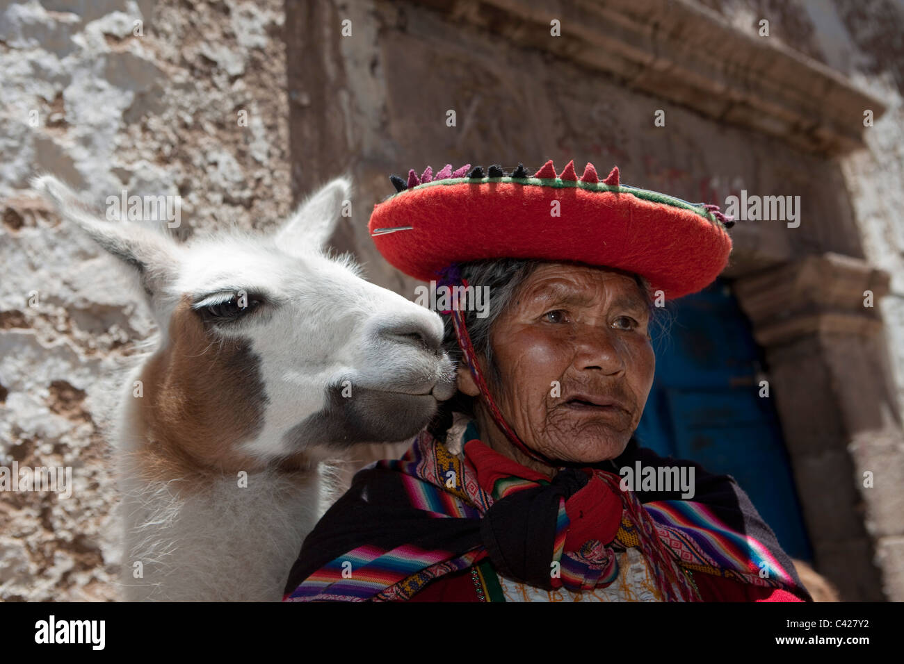 Peru, Cusco, Cuzco, Old Indian woman with llama in San Blas district. UNESCO World Heritage Site. Stock Photo