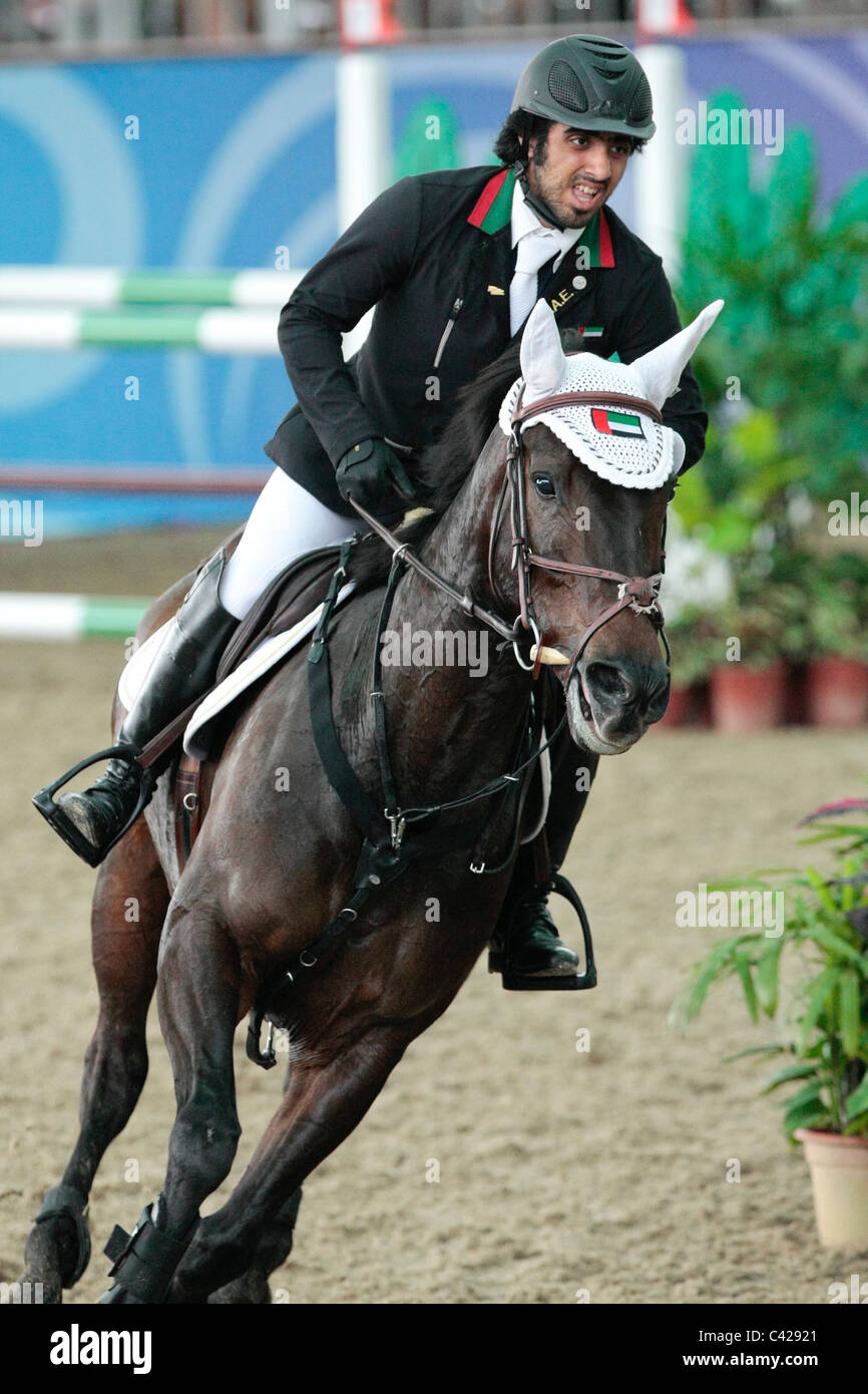 Sheikh Ali Abdullah M.Alqassimi of UAE riding PEARL MONARCH representing Asia in the Youth Olympic Games Jumping Team Round 2. Stock Photo
