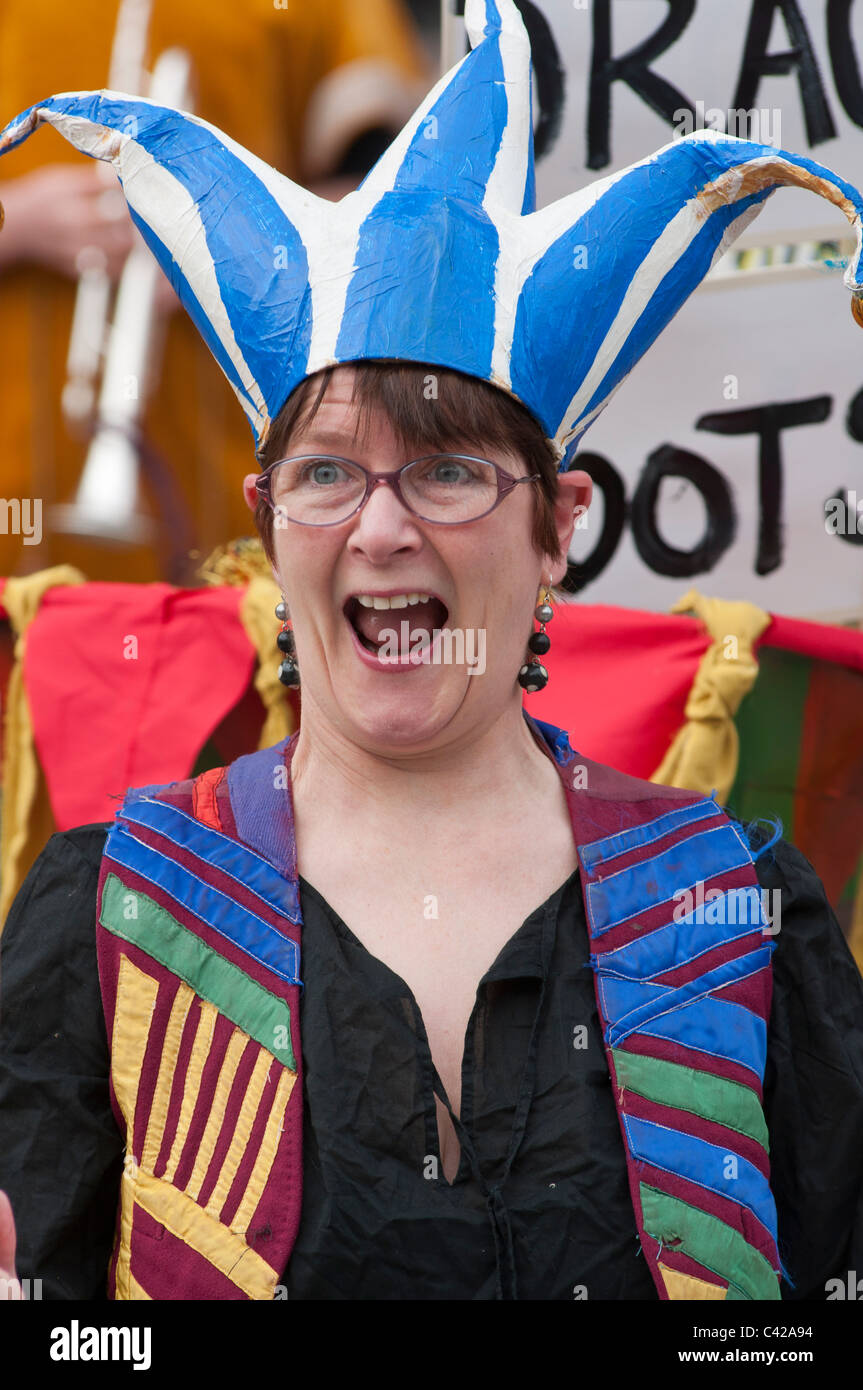 A female Jester at Saint George's day celebrations in the medieval city of Chester. Cheshire, England. Stock Photo