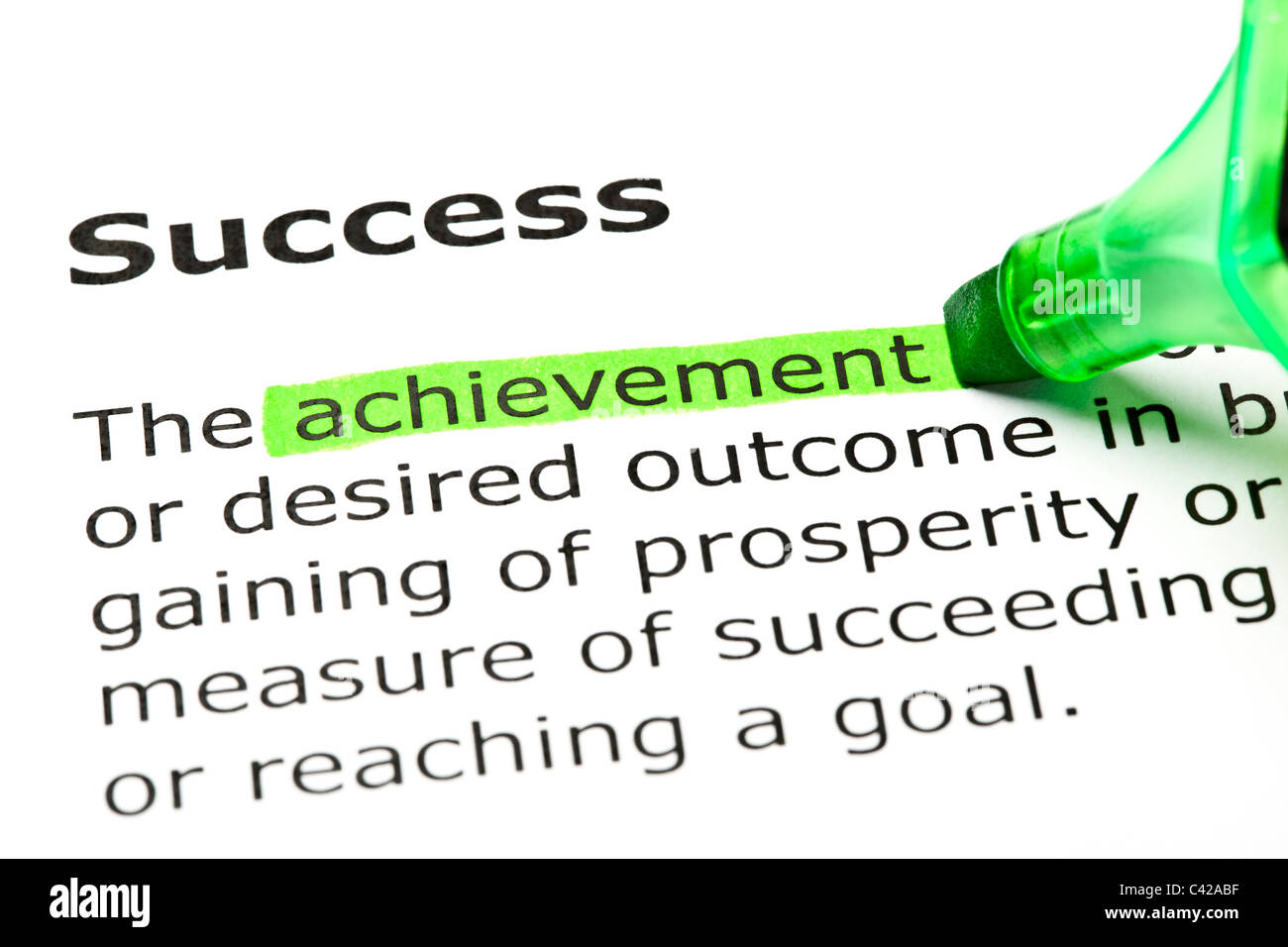 'Achievement' highlighted in green, under the heading 'Success' Stock Photo