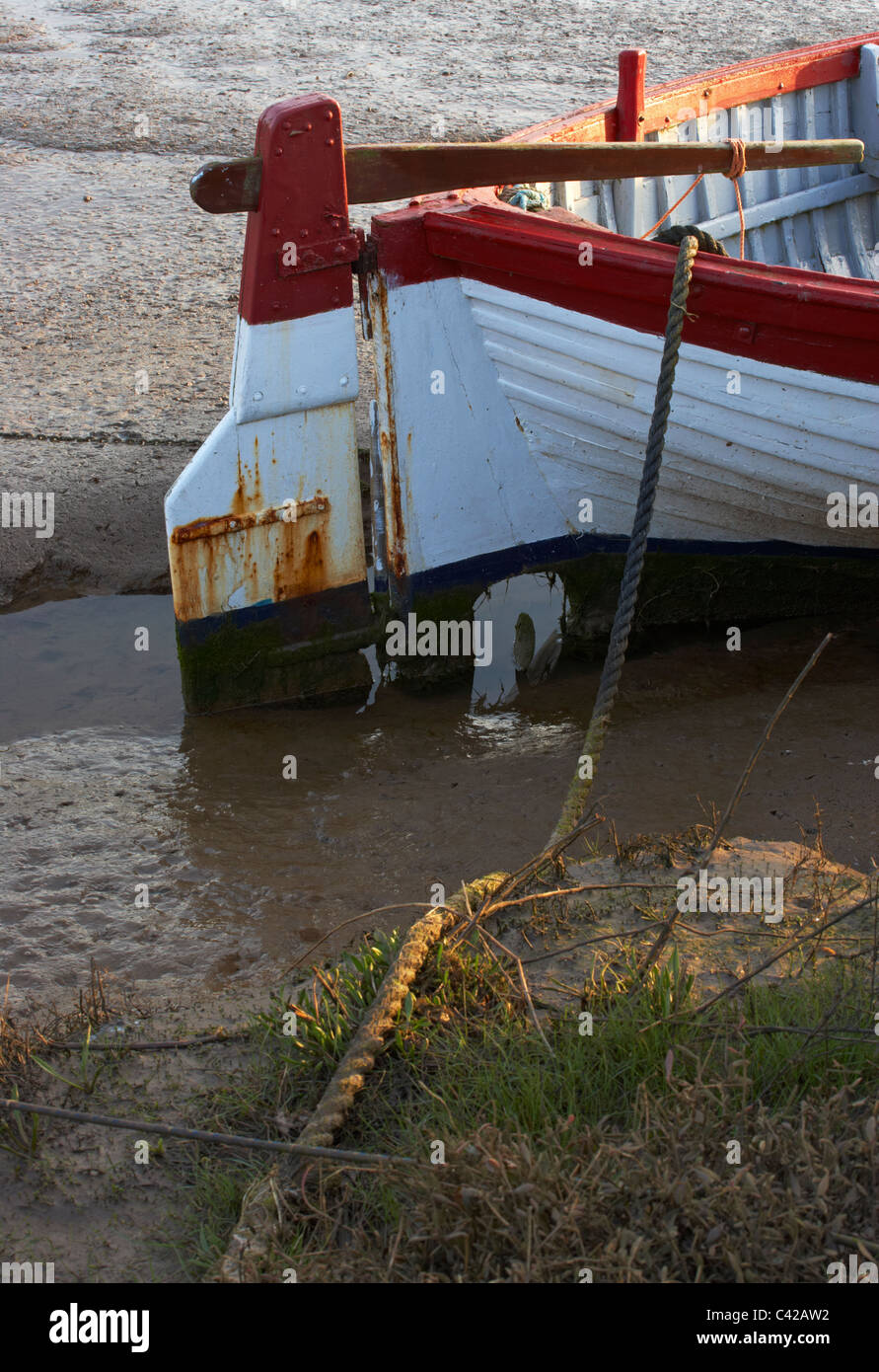 A study of a boat at Thornham Creek in North Norfolk, England Stock Photo