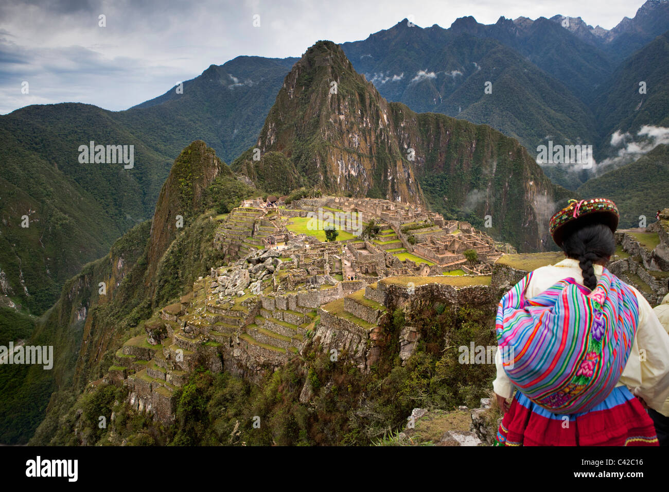 Peru, Aguas Calientes, Machu Picchu.15th-century Inca site, Indian tourist, Indian woman. Stock Photo