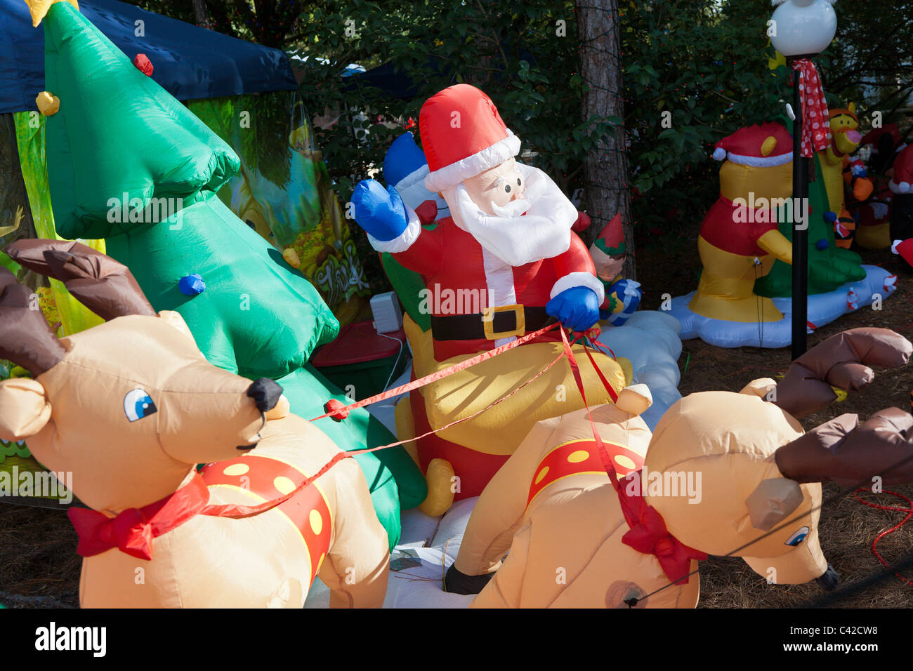 Santa inflatable Christmas holiday decorations in Fort Wilderness Resort at Walt Disney World