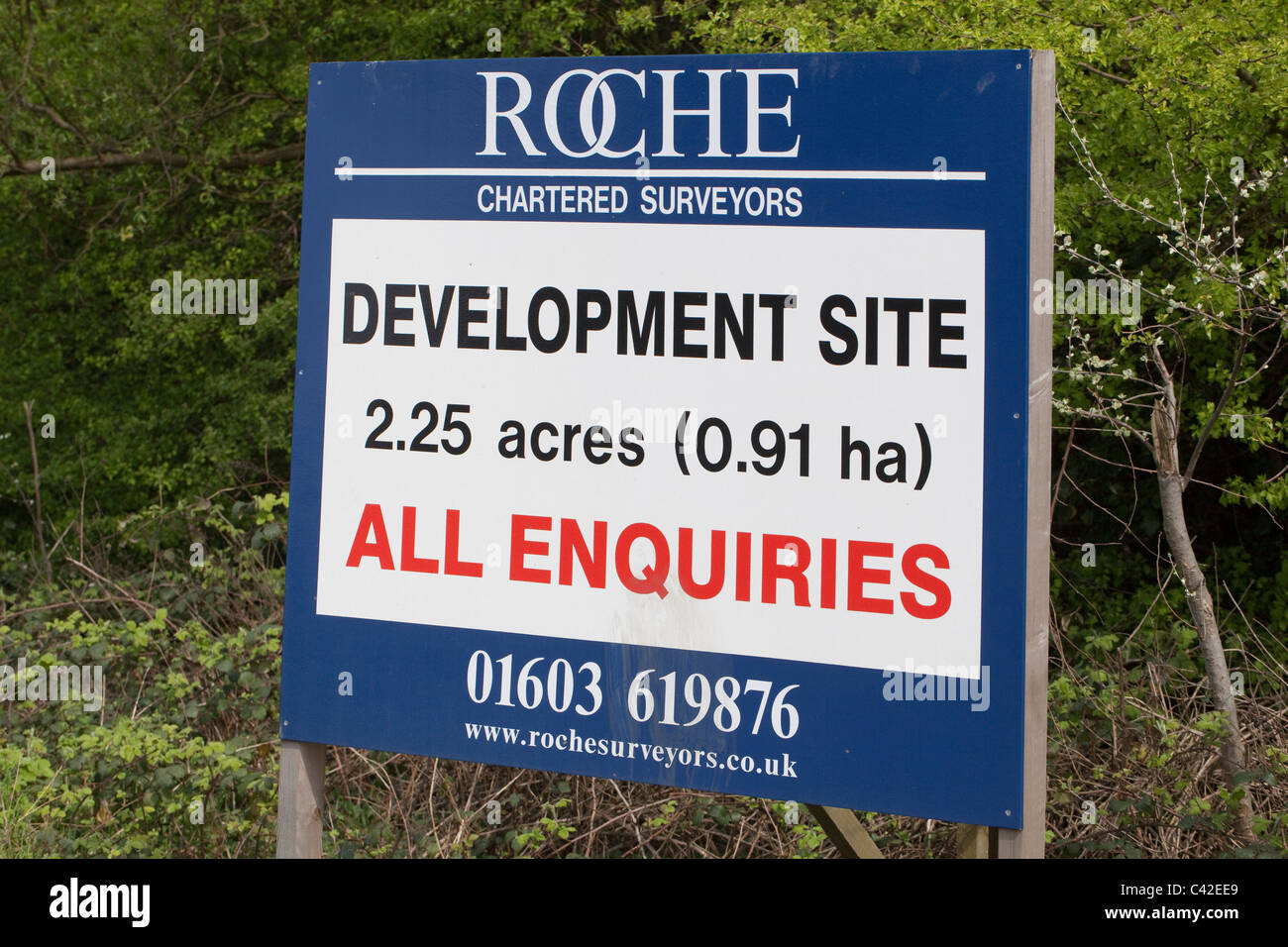 Sign. Sale of infill land on a 'brown field' site. Norwich. Norfolk. UK Stock Photo