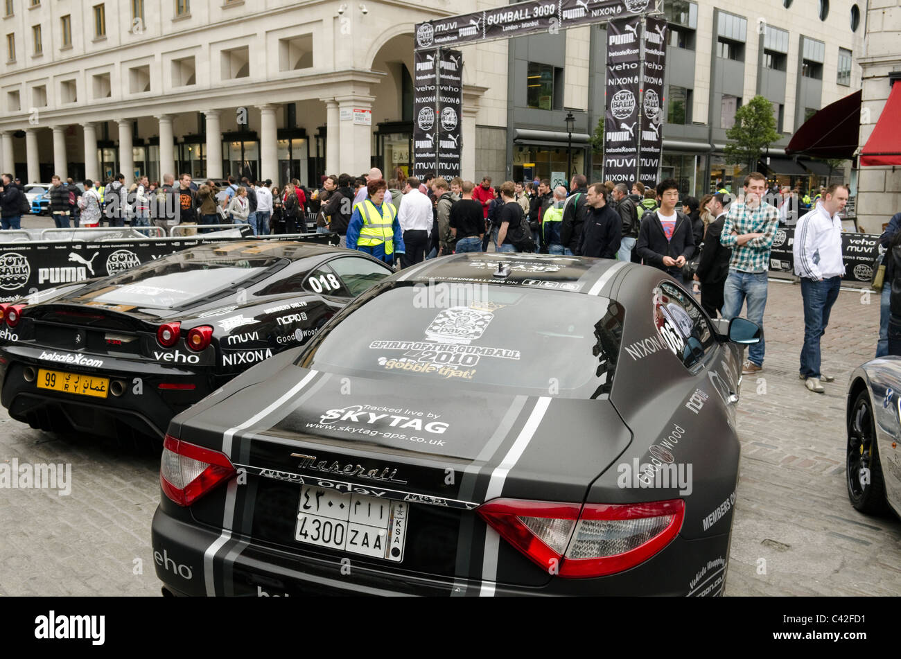 Maserati luxury sports car and crowds of people in Covent Garden at the  start of the Gumball rally 3000 Stock Photo - Alamy
