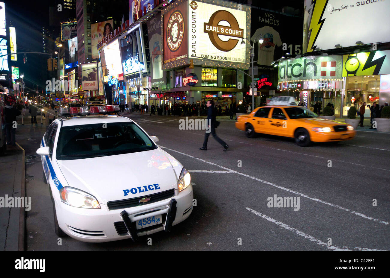Police car in Time Square at night Stock Photo