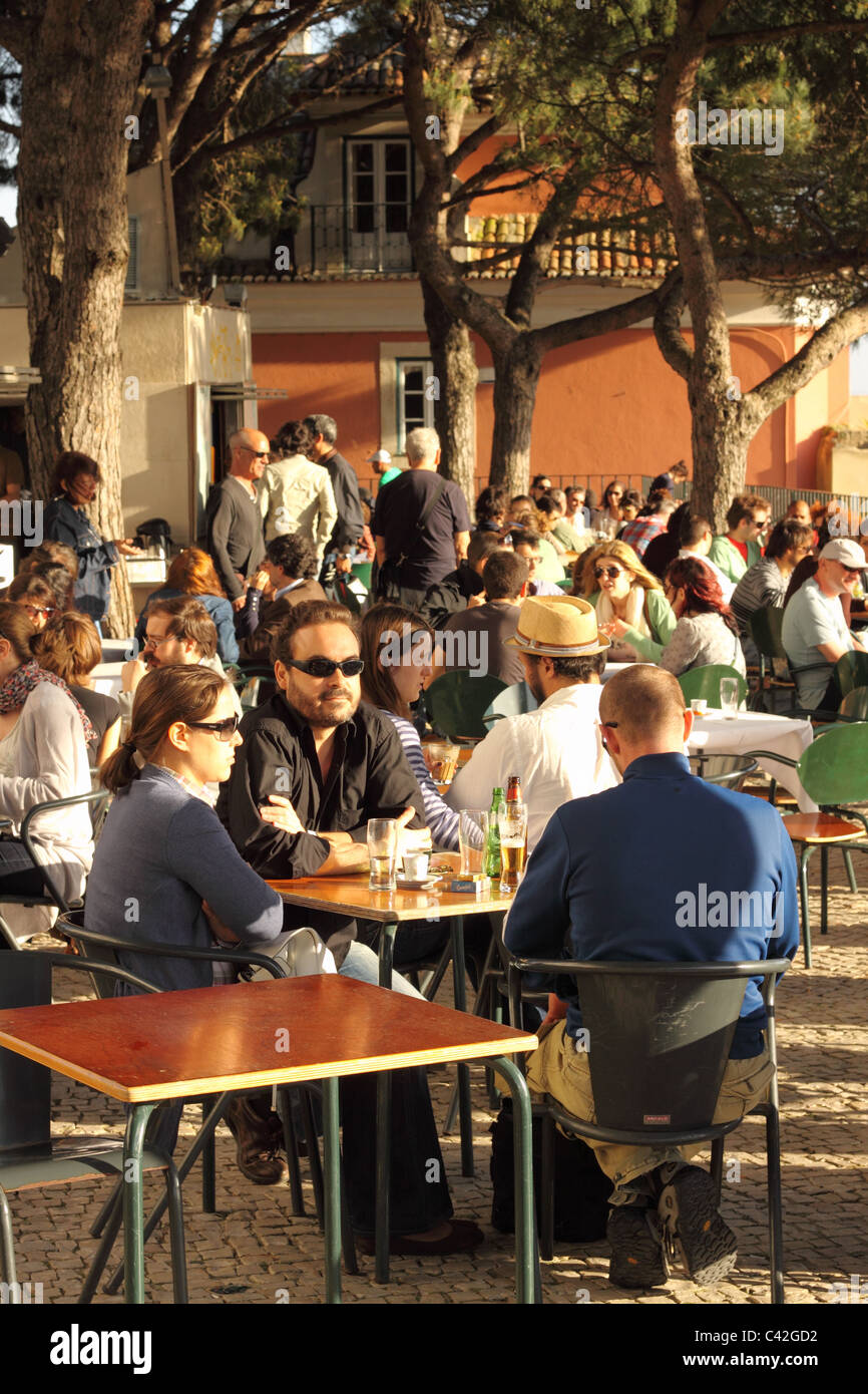 Lisbon Portugal the Miradouro da Graca viewing terrace open air cafe in the evening Stock Photo