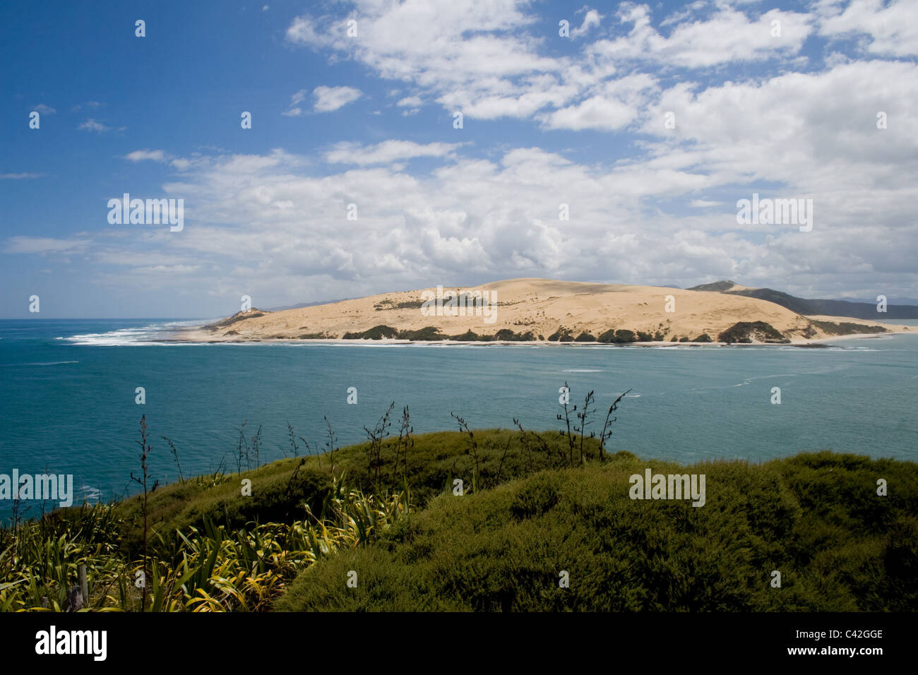 Looking north from Omapere  at the giant sand dunes at the entrance to Hokianga harbour, Far North, North Island, New Zealand Stock Photo