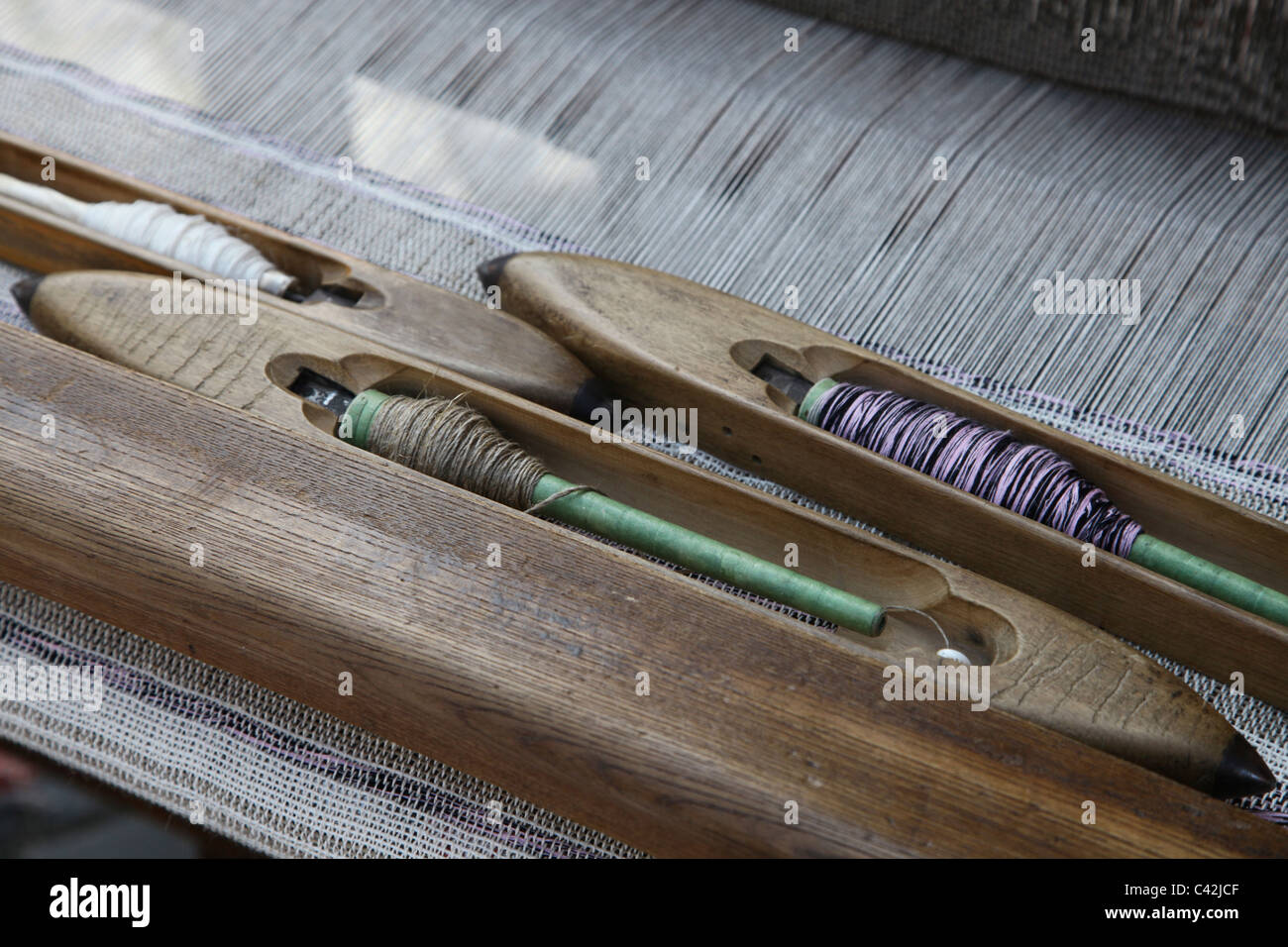 Spools of thread of an old loom Czech Stock Photo