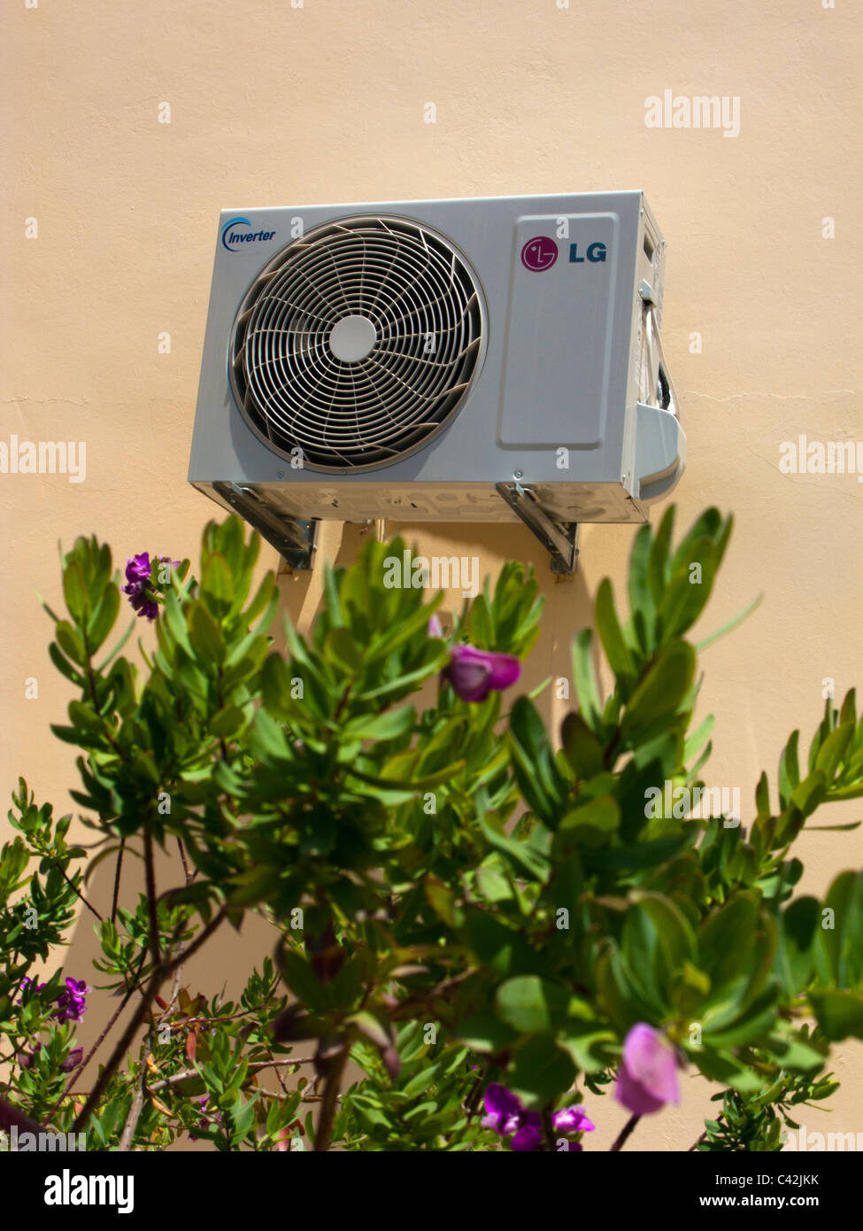 AIR CONDITIONING UNIT ON A WALL IN GREECE Stock Photo Alamy