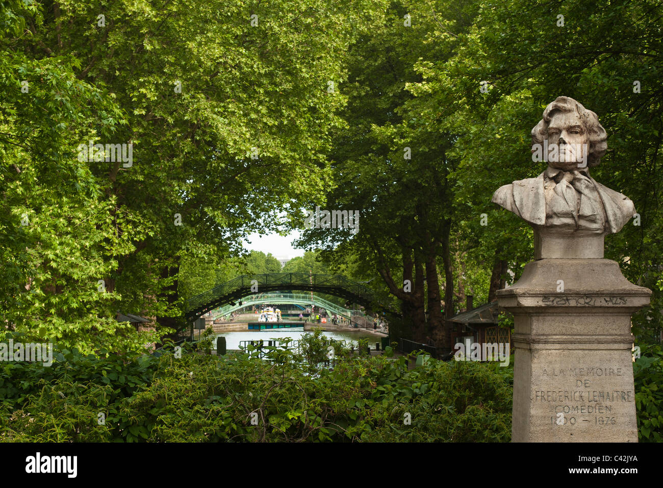 PARIS, FRANCE - MAY 08, 2011:  Bust of Frederick Lemaitre in the Square named in his honour with the Canal St-Martin in the background, Stock Photo