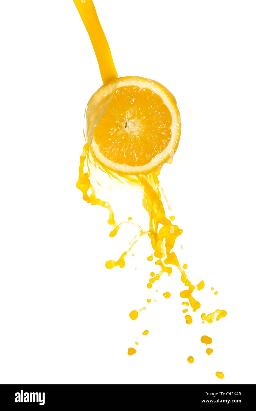 orange juice splash isolated on white background Stock Photo - Alamy