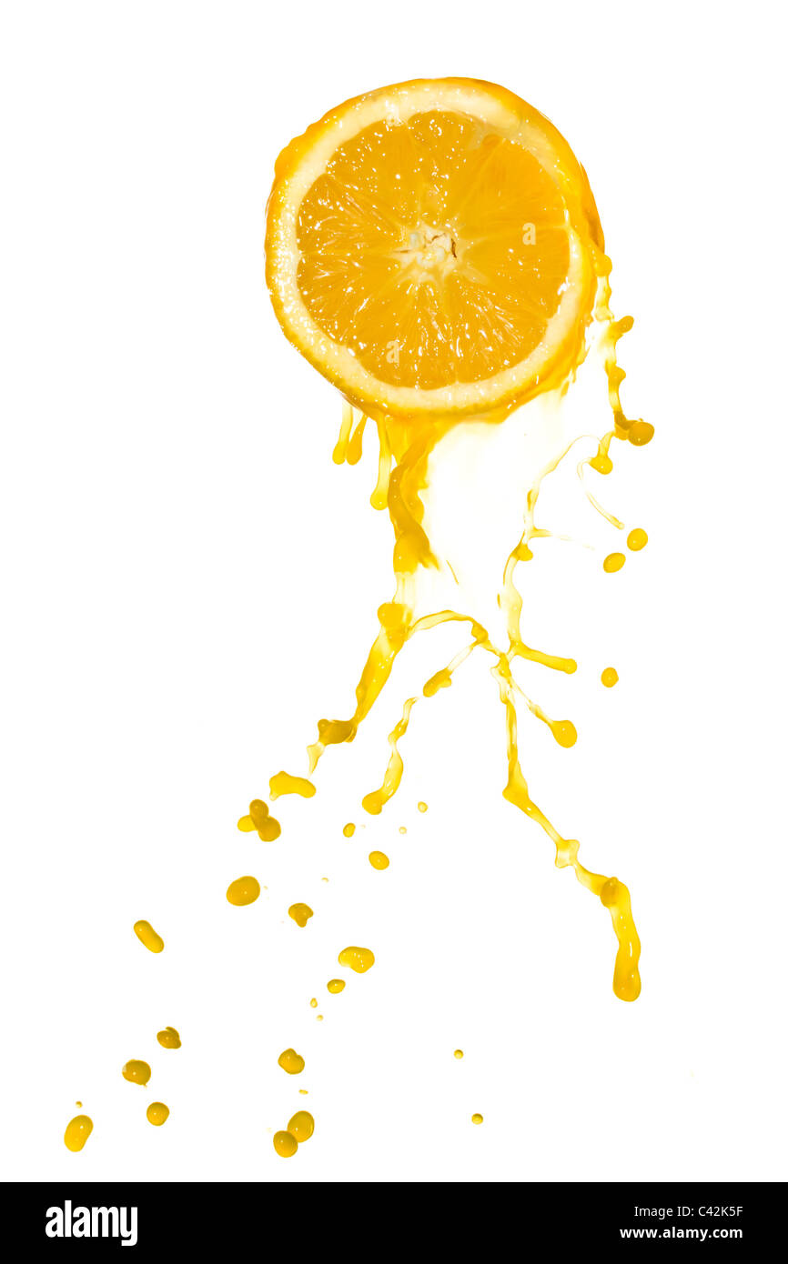 orange juice splash isolated on white background Stock Photo - Alamy
