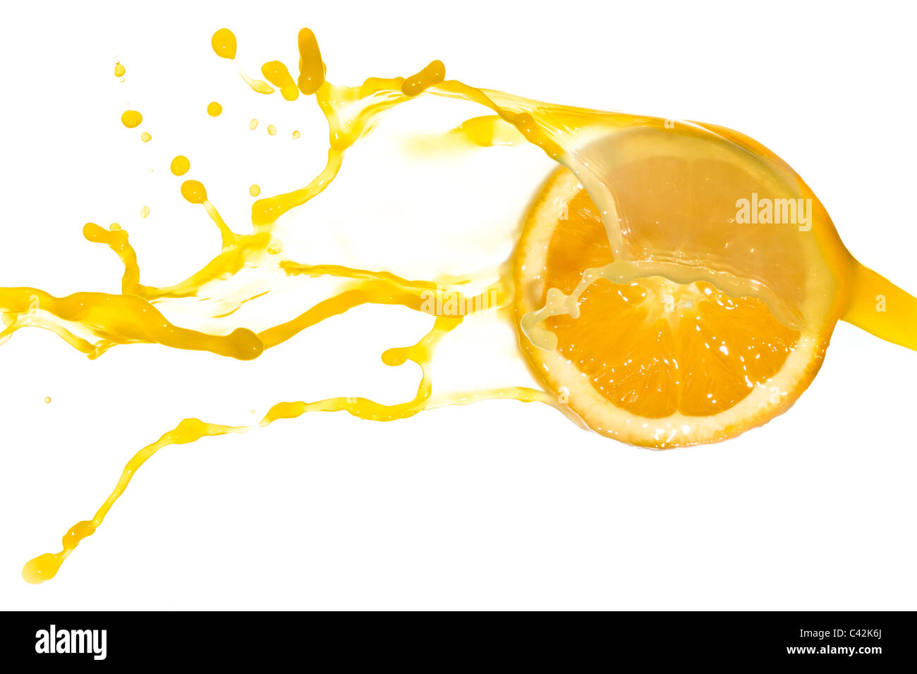 orange juice splash isolated on white background Stock Photo - Alamy