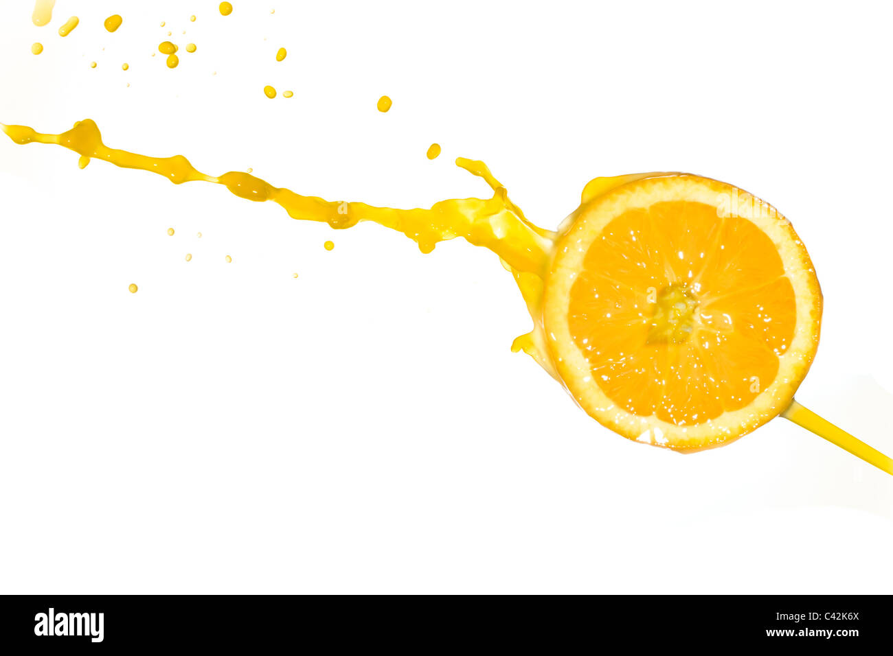 orange juice splash isolated on white background Stock Photo - Alamy