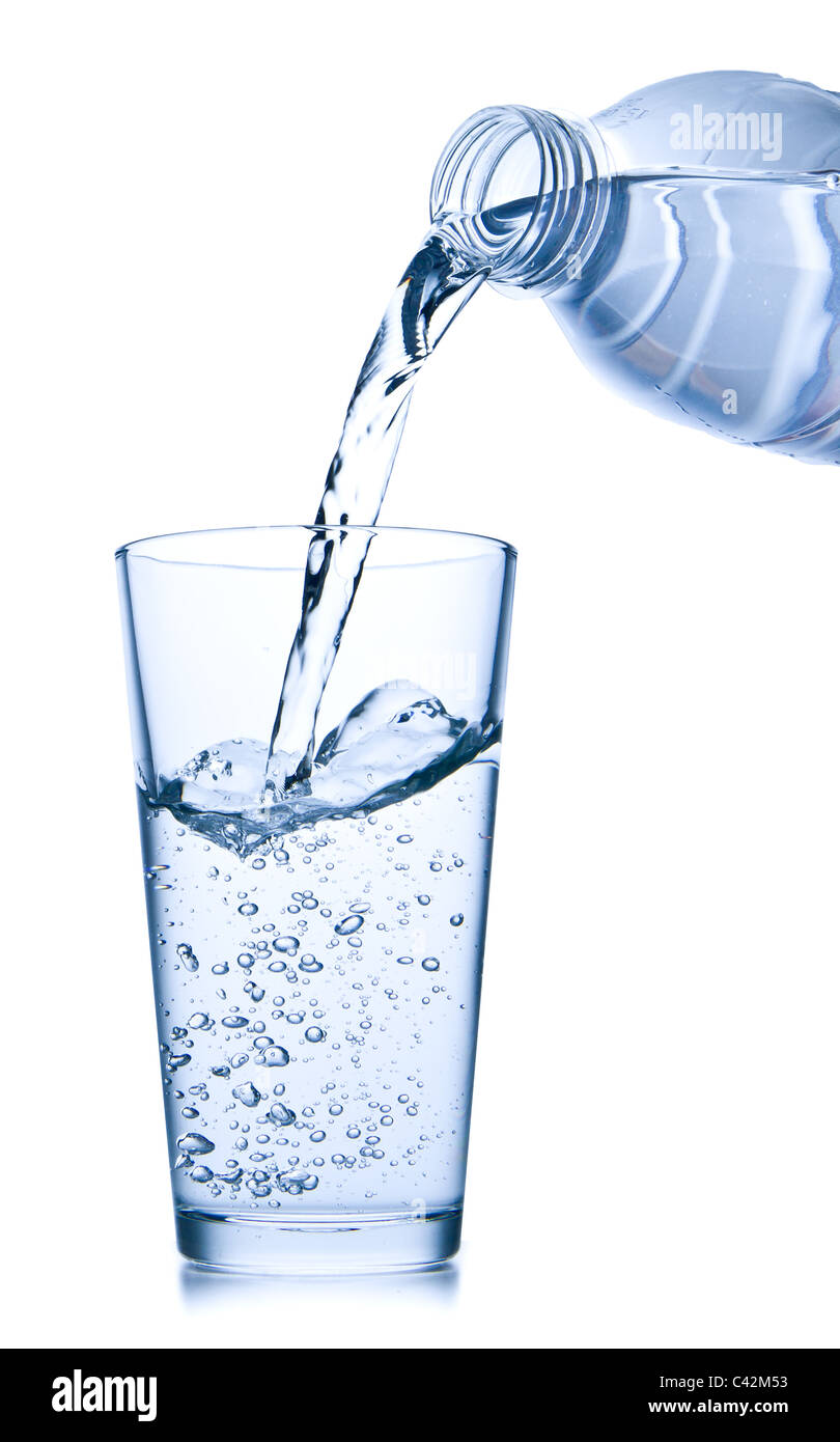 water pouring into glass on white background Stock Photo Alamy
