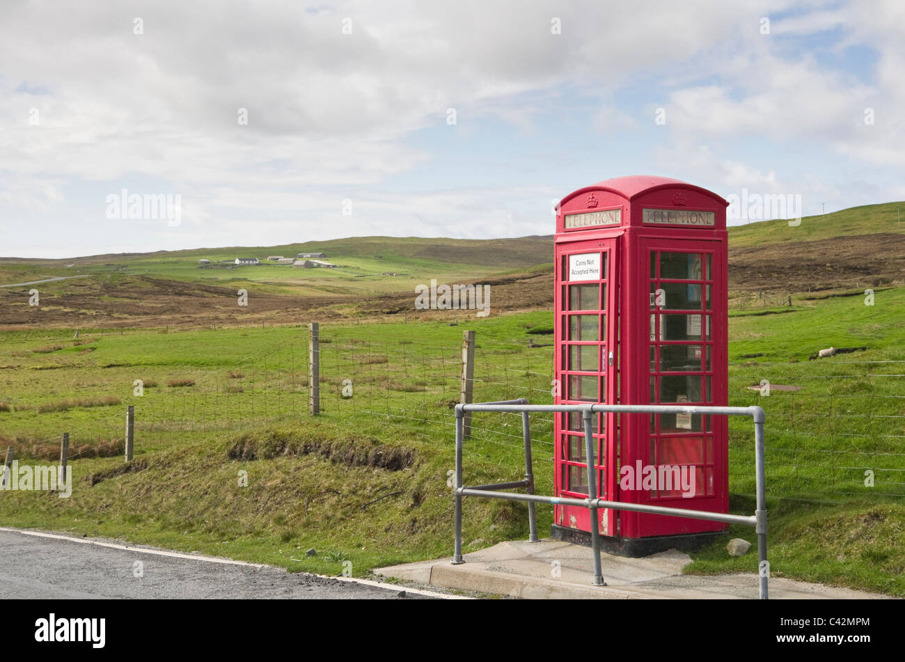 Voe, Northmavine, Shetland Islands, Scotland, UK, Europe. Rural red telephone kiosk. Stock Photo