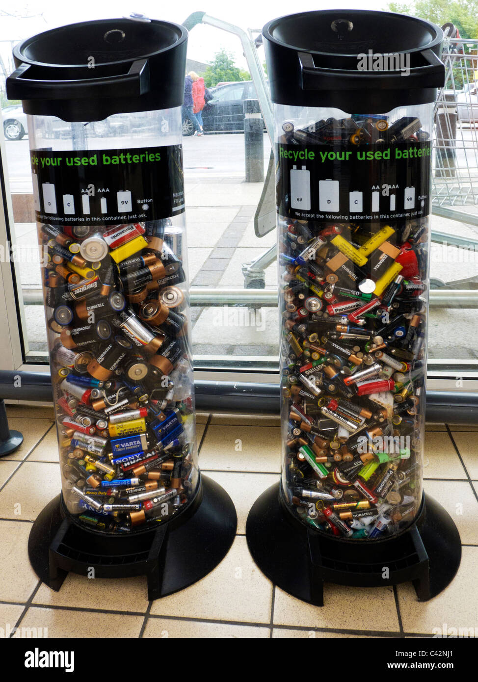 Battery recycling container in public shopping area Stock Photo Alamy