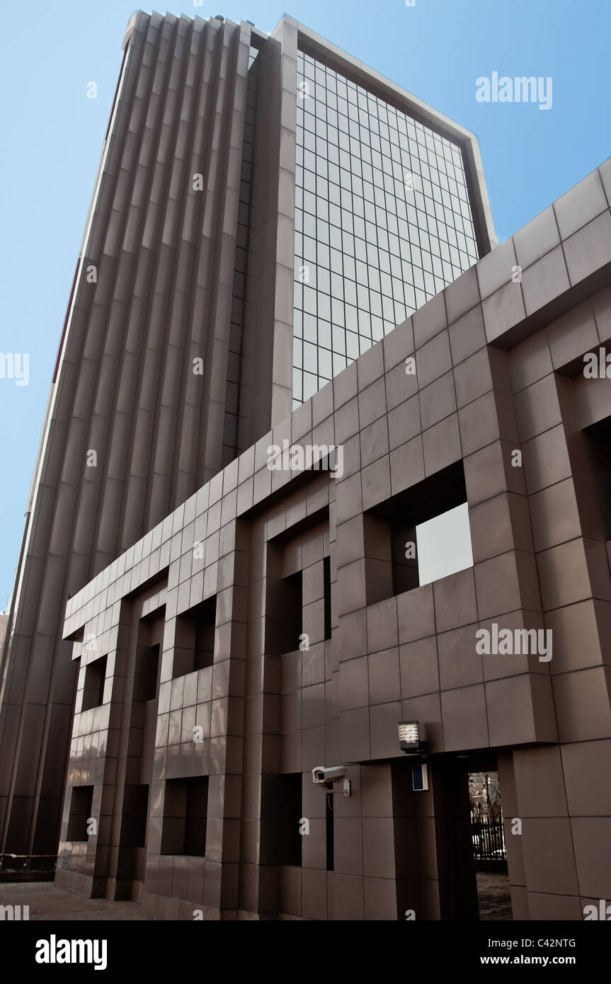 Central view of local bank against blue sky Stock Photo