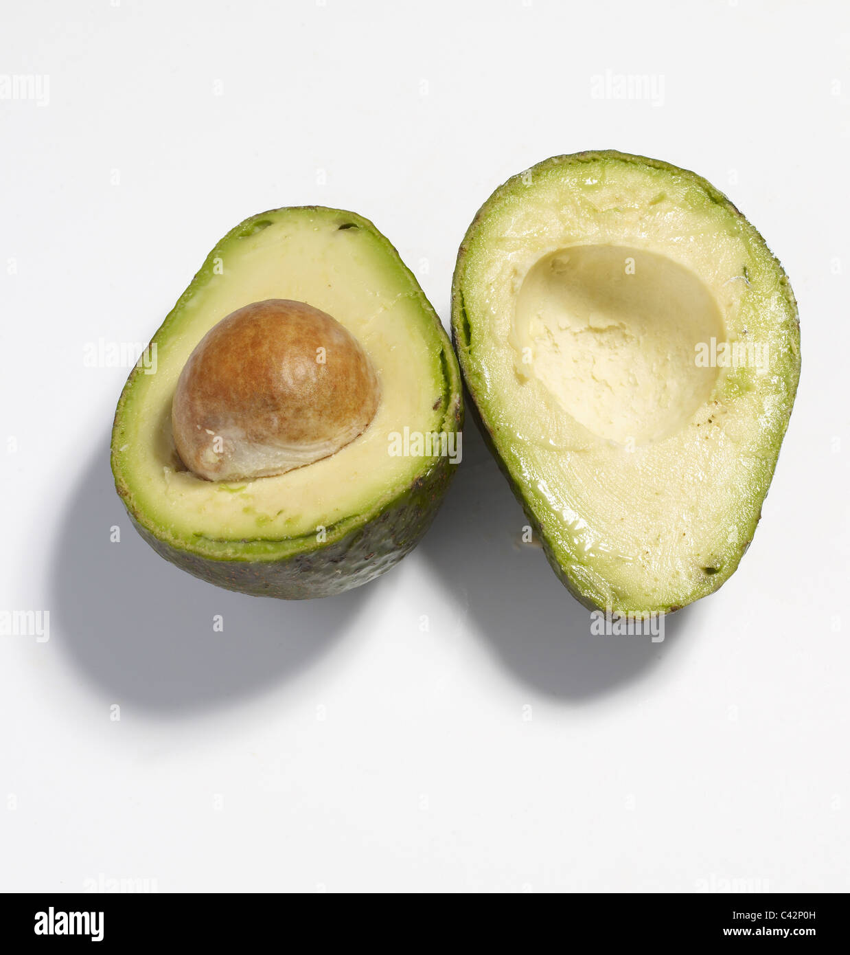 Avocado cut in half Stock Photo