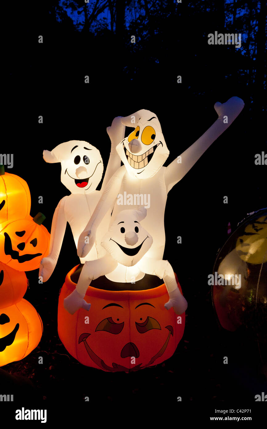 Inflatable ghost and pumpkin decorations for Halloween fun Stock Photo