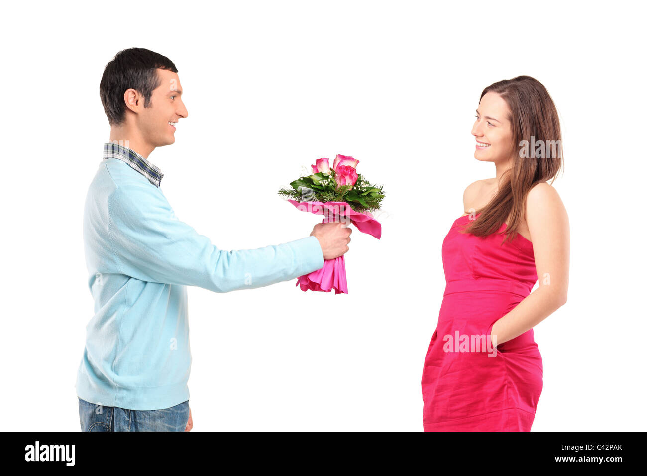 Boyfriend giving bunch of flowers to his girlfriend Stock Photo Alamy