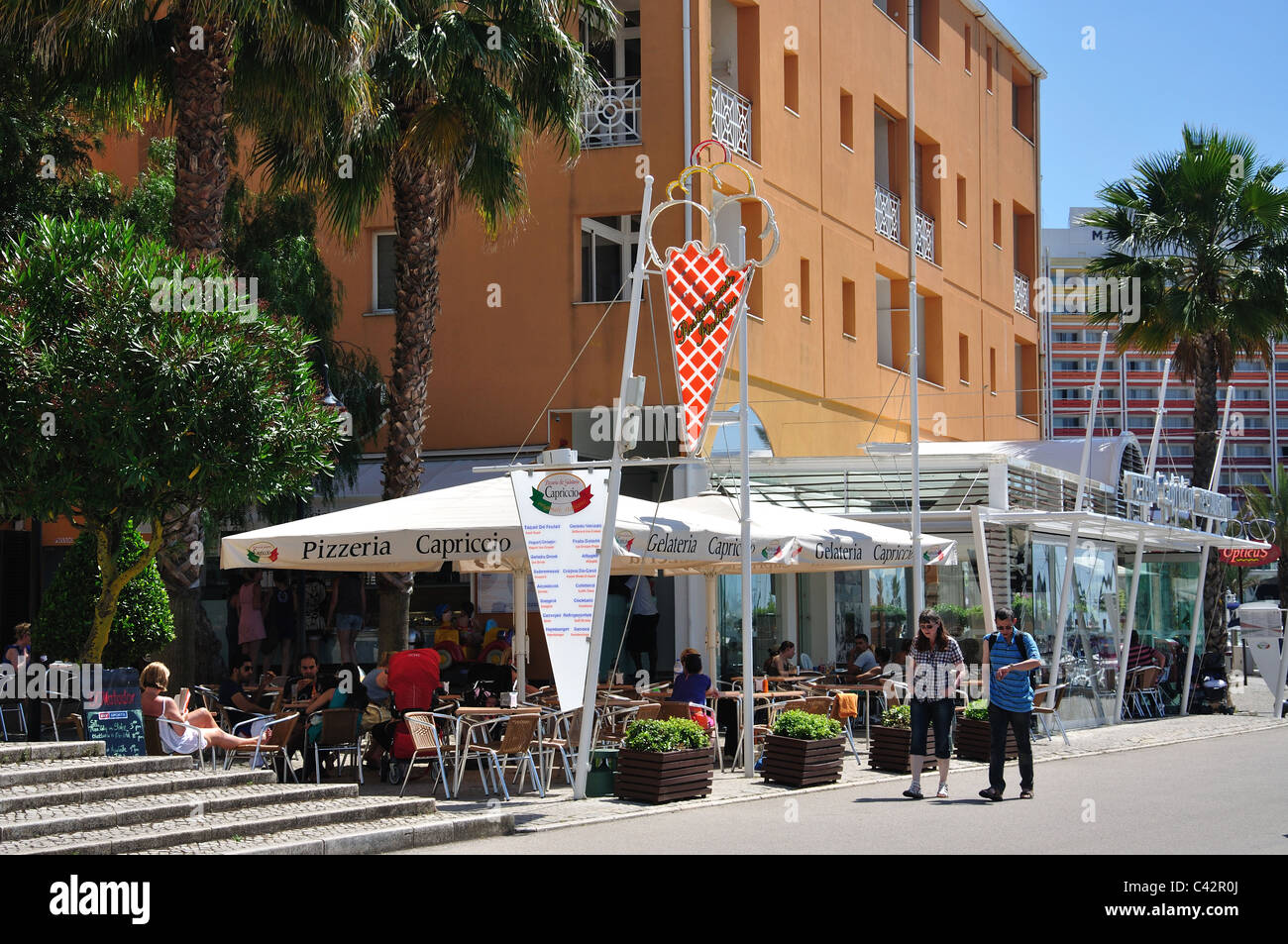 Outdoor restaurant, Vilamoura Marina, Vilamoura, Algarve Region, Portugal Stock Photo