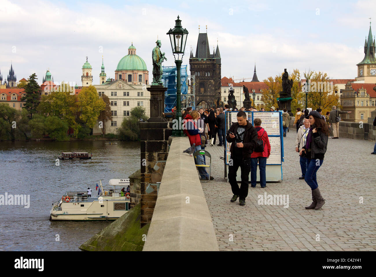 Tourists along Charles Bridge in Prague Stock Photo