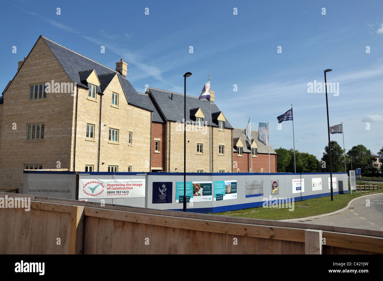 the advertising boards and some of the completed properties on the new