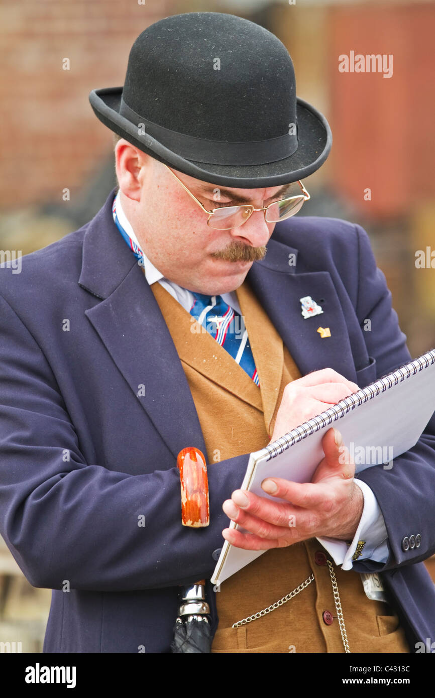 Actor at Beamish open-air museum posing as a banker, County Durham, Englad Stock Photo