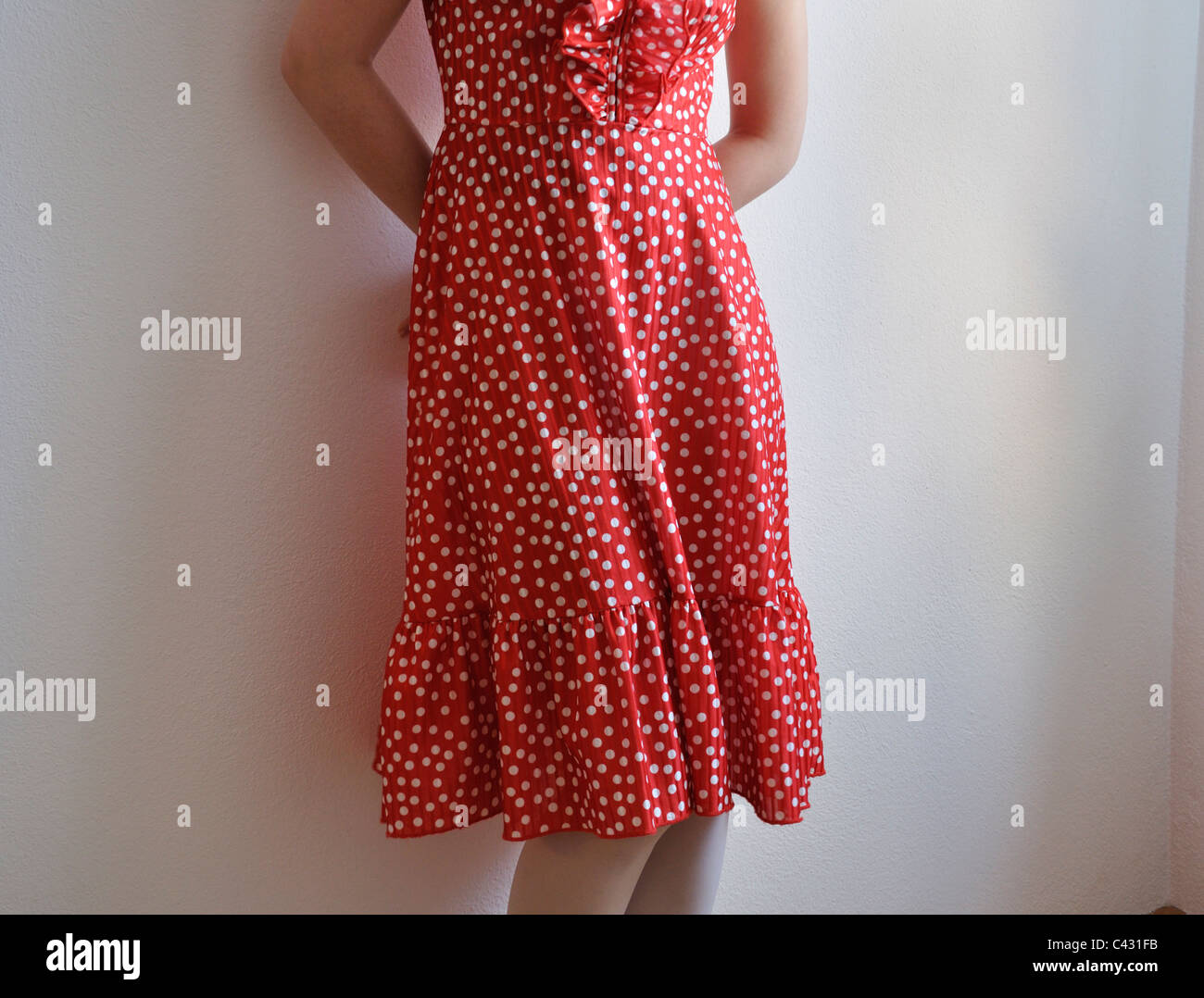 Girl wearing polka dot dress hi-res stock photography and images - Alamy