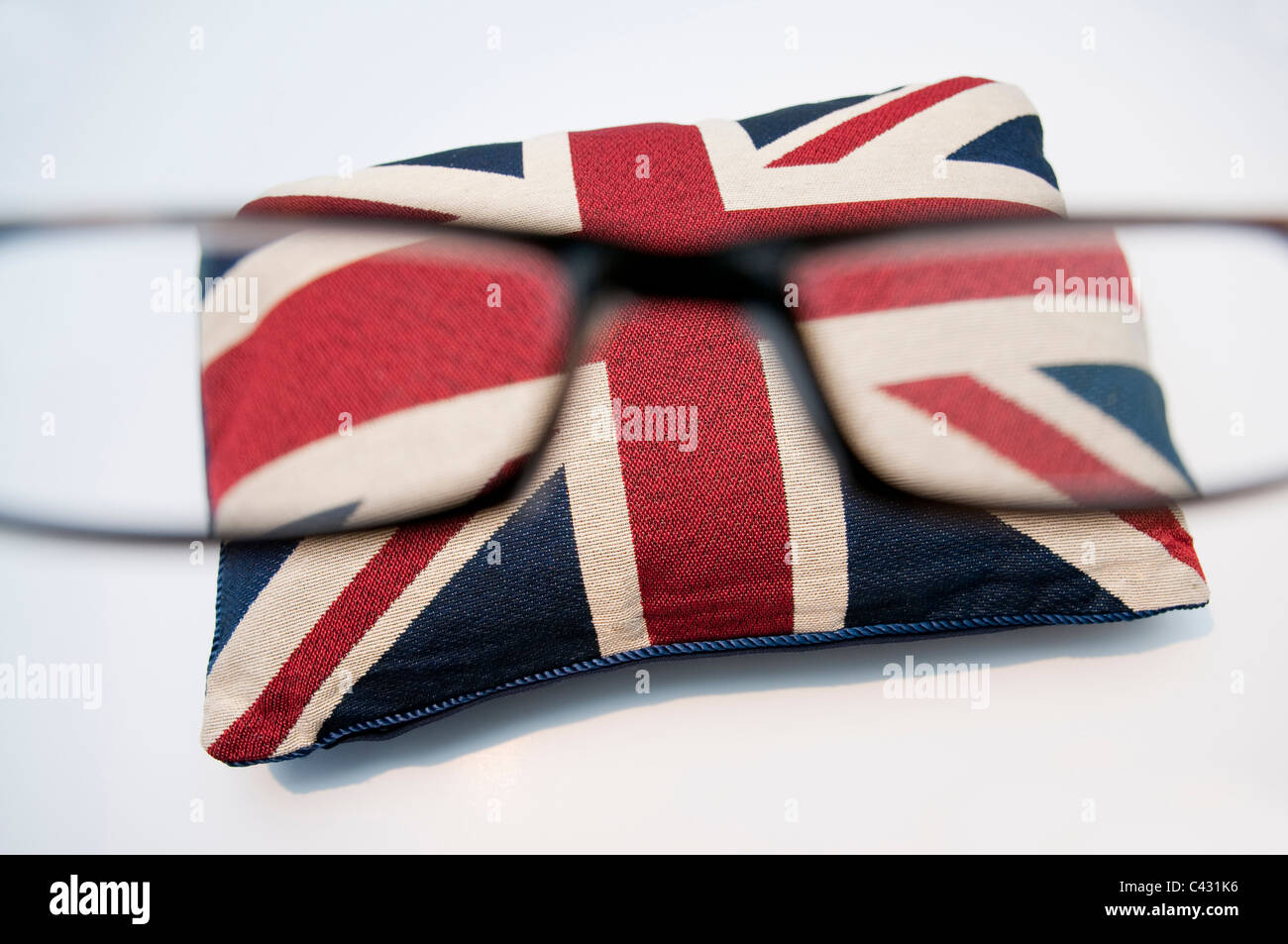 Looking at a Union Jack cushion through spectacles Stock Photo