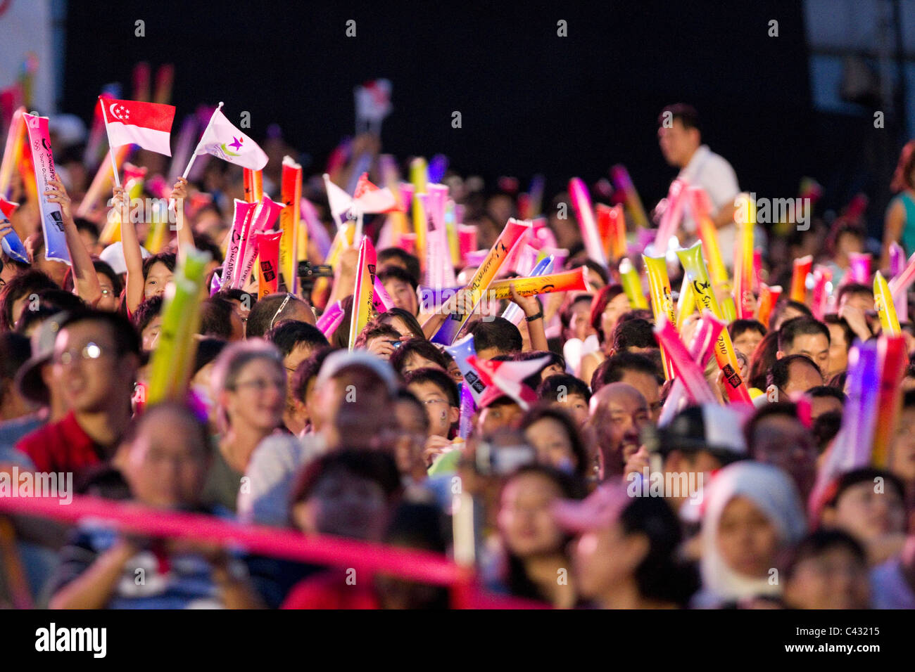 Audience await the start of the 2010 Singapore Youth Olympic Games