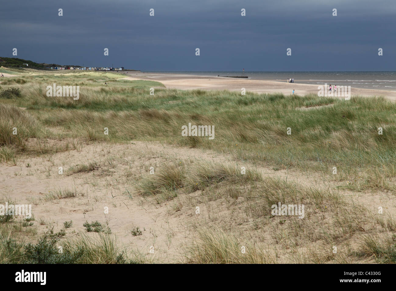 Storm clouds over a Lincolnshire beach. Stock Photo