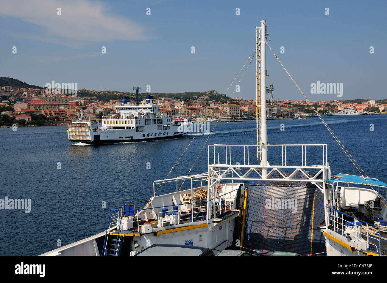 Ferries to and fro from Palau ,to  La Maddalena,(in view) Sardinia, Italy Stock Photo