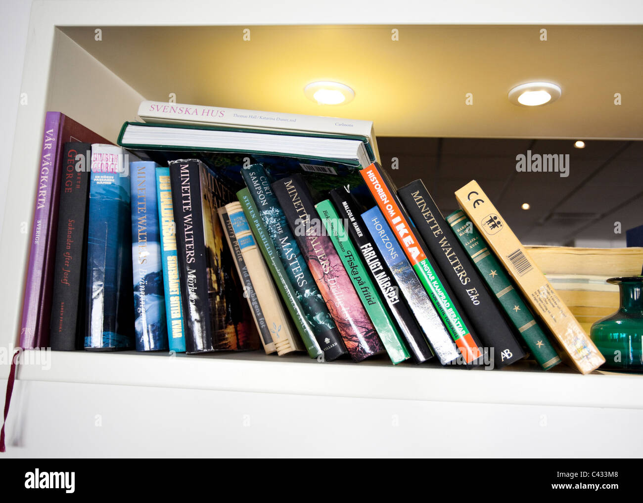 Group of books in a shelf Stock Photo Alamy