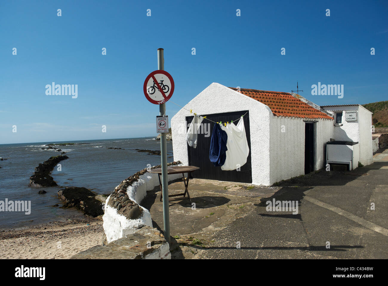 Washing on the shore Pittenweem Stock Photo