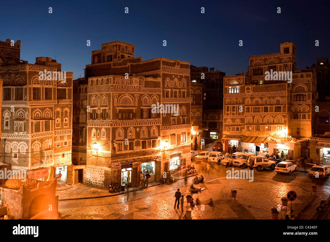The entrance at Bab al Yemen, into the Old City of Sanaa, at dusk - Yemen Stock Photo
