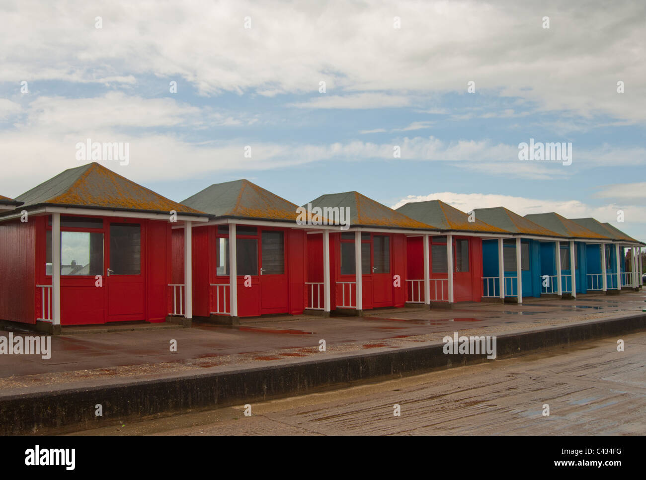 Red and blue beach huts in Mablethorpe, Lincolnshire Stock Photo Alamy